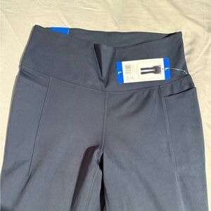 Jockey Navy Blue Flare Leggings, new with tags. Side pockets.
